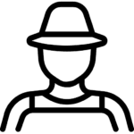 A gardener watering plants in a garden with a watering can.