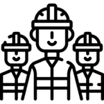 A group of workers collaborating on a construction site, wearing safety gear.